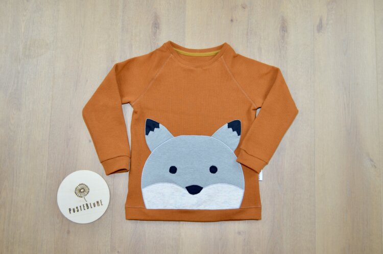 Pullover aus orangem Waffelstrick Jersey mit Wolf Stickmotiv